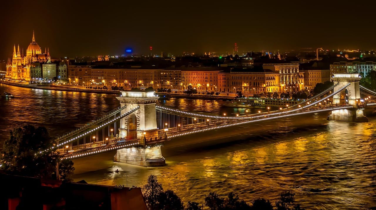 The Iron Bridge at night. The far bank has always been a different city.