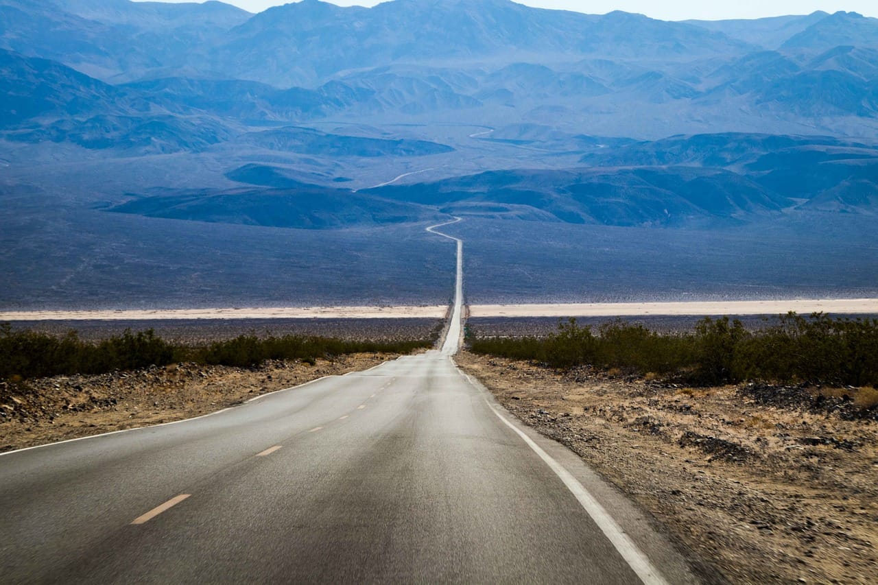 The flats at noon. The road is the only line that is not white.